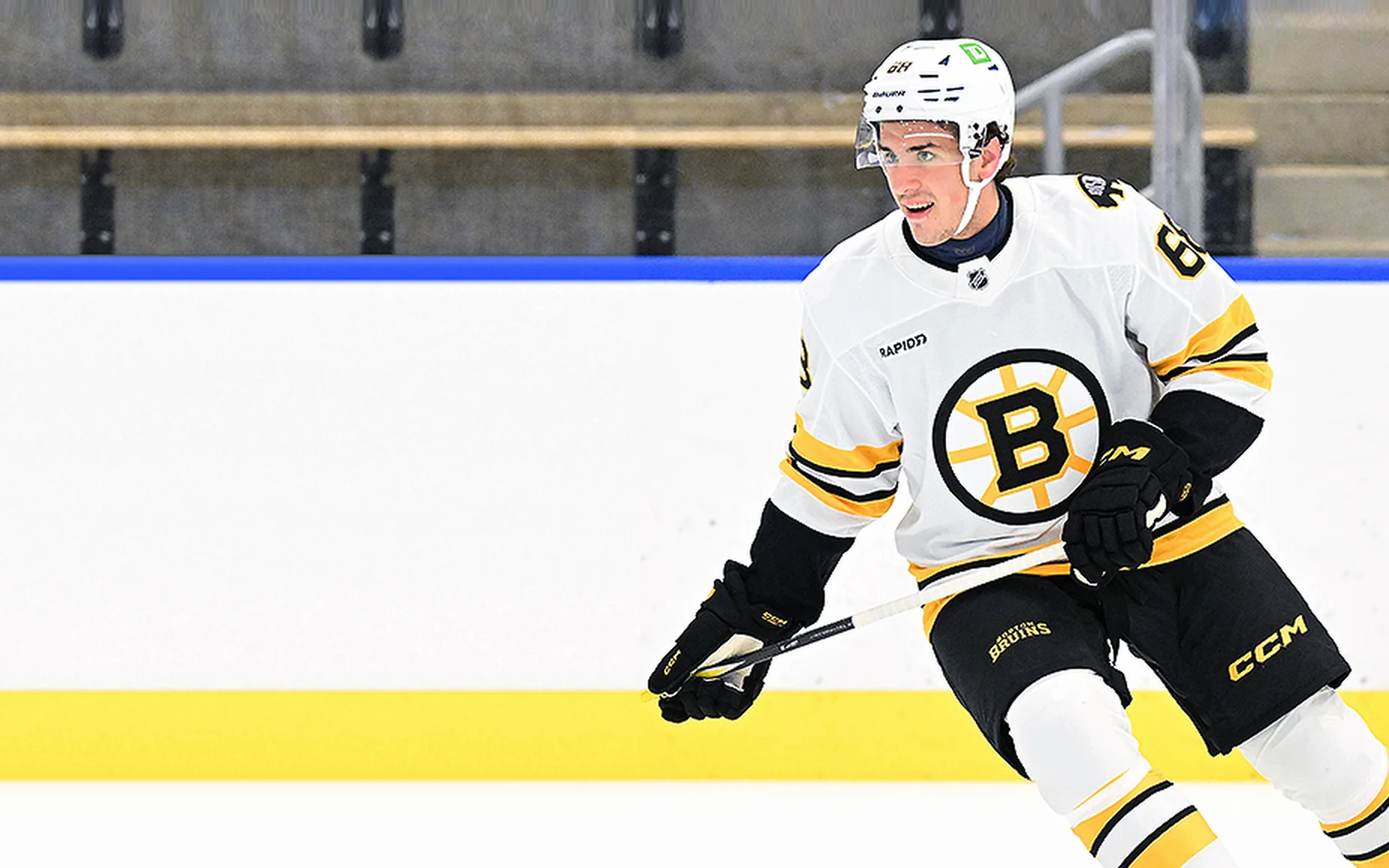 Cullen McCrate, ISM client and Boston Bruins 2026 NHL Draft pick, on the ice in a Bruins jersey